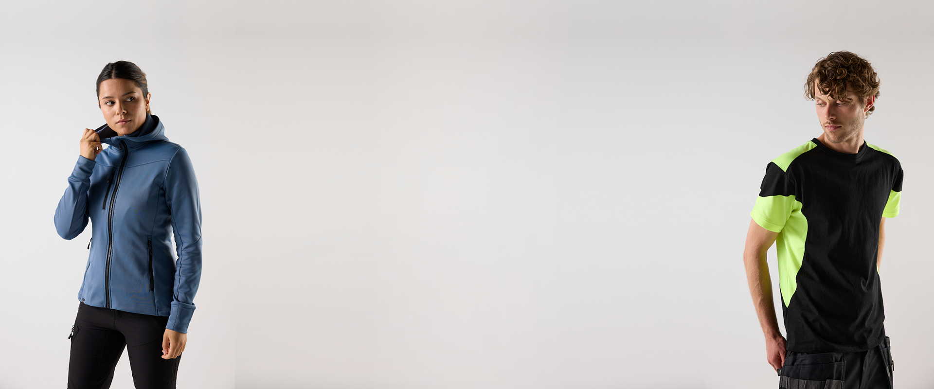 A female model dressed in profile clothes and a male model dressed in work clothes